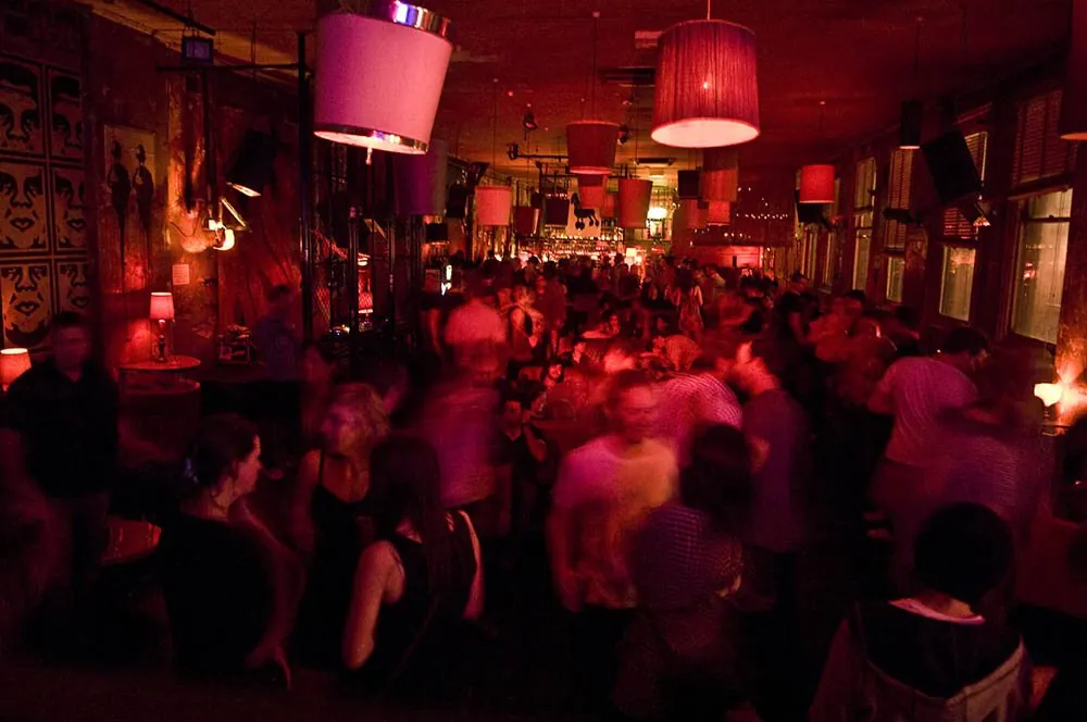 Revolver Upstairs — back room under red lights